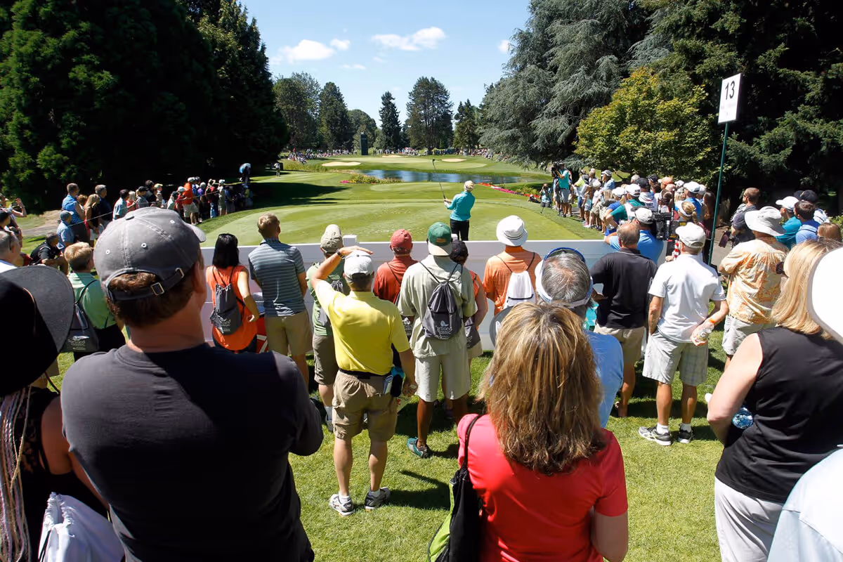 Fans watching LPGA player tee off at Columbia Edgewater