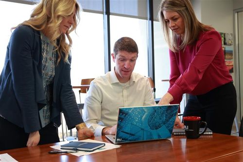 Team members at event