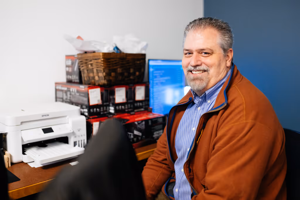 Stratus team member Doug McLeod at his desk.