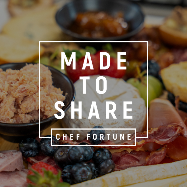 Vibrant, Mediterranean-inspired spread that balances rich, savory elements with fresh, sweet accents.