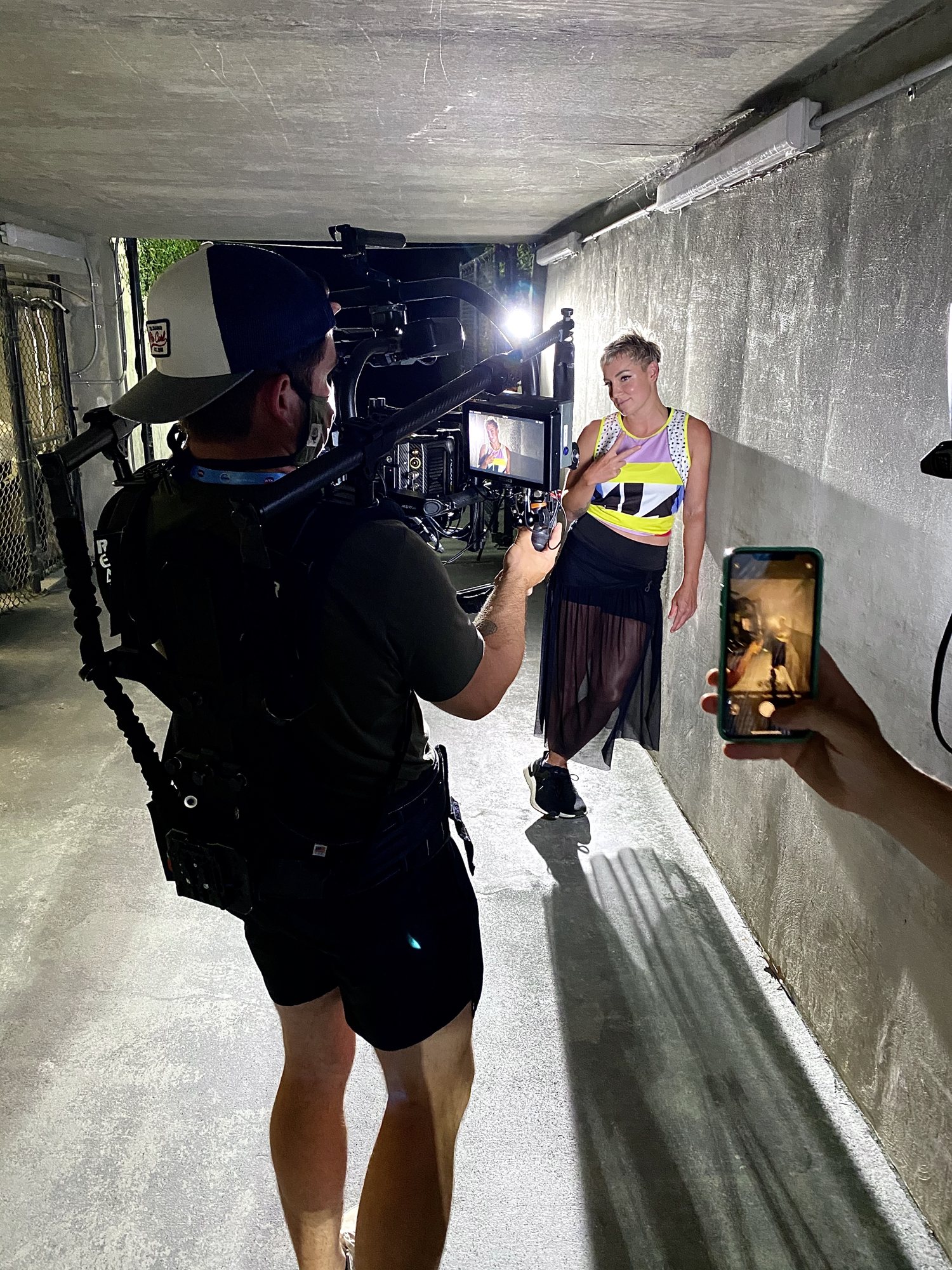 Greyline Media Steadicam walk-and-talk with an athlete in a stadium tunnel