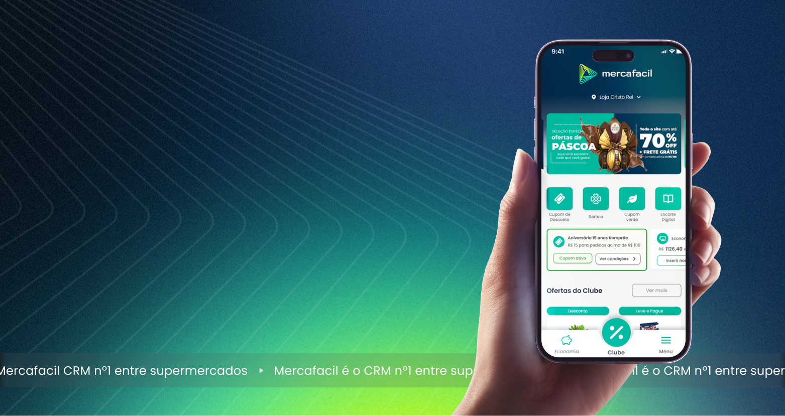 Hand holding a smartphone displaying the Mercafacil app with Easter offers and discount coupons on screen.
