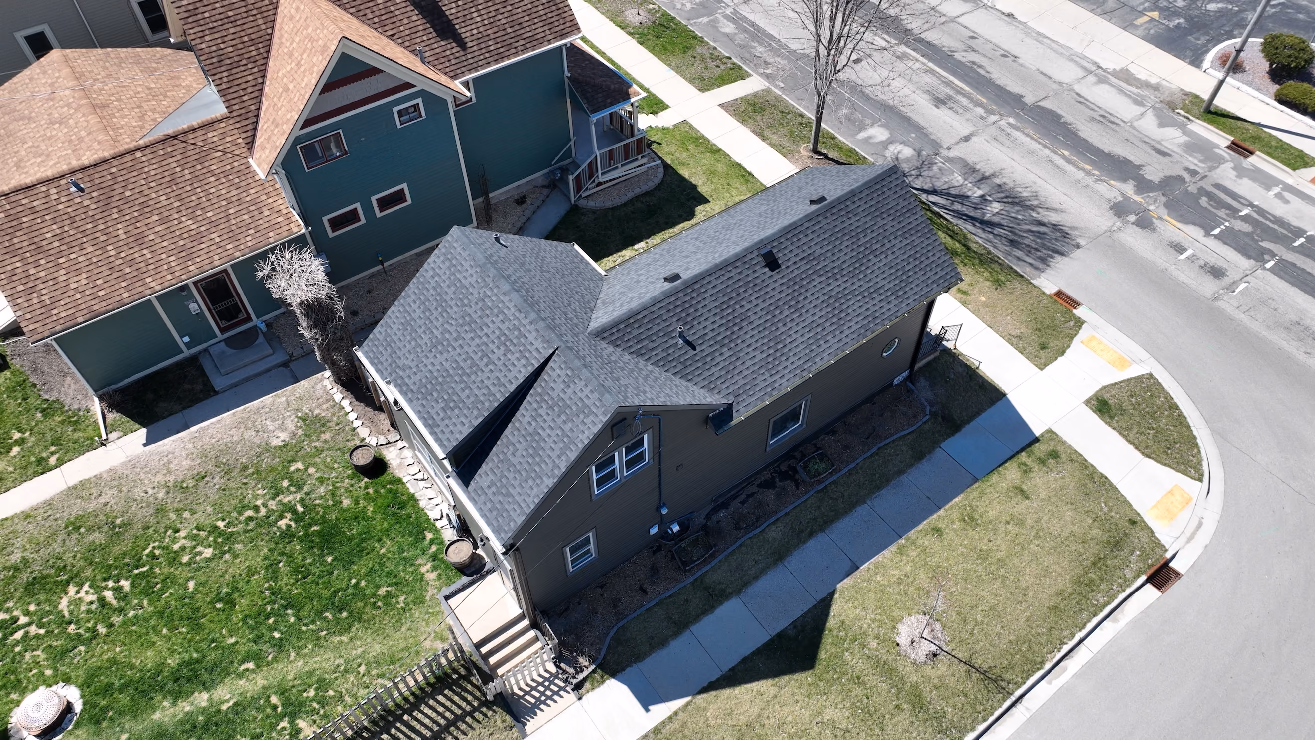 Aerial view of a home in Verona, WI with a dark gray architectural asphalt shingle roof