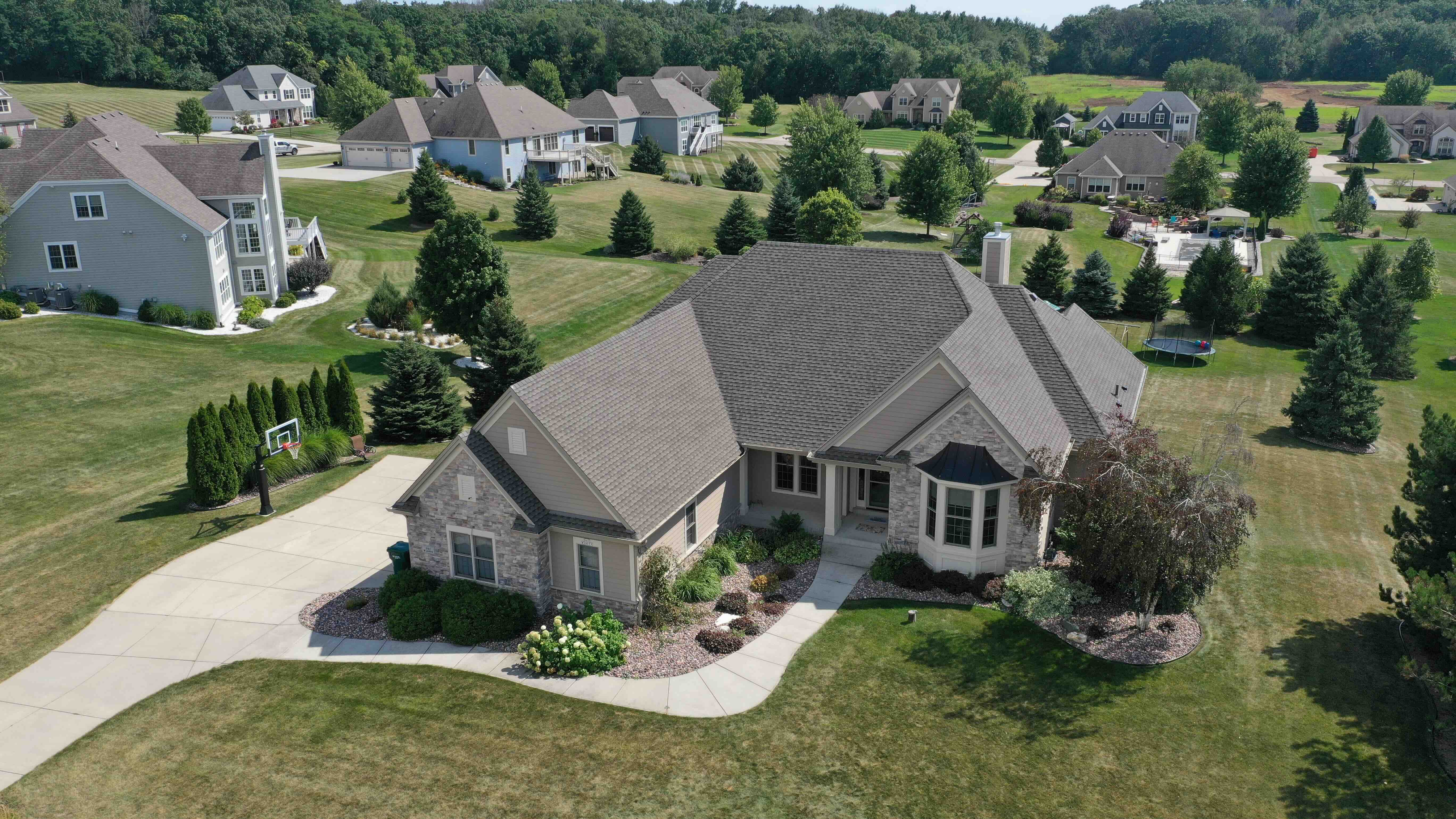 Aerial view of a Milwaukee, WI home with a new architectural asphalt shingle roof