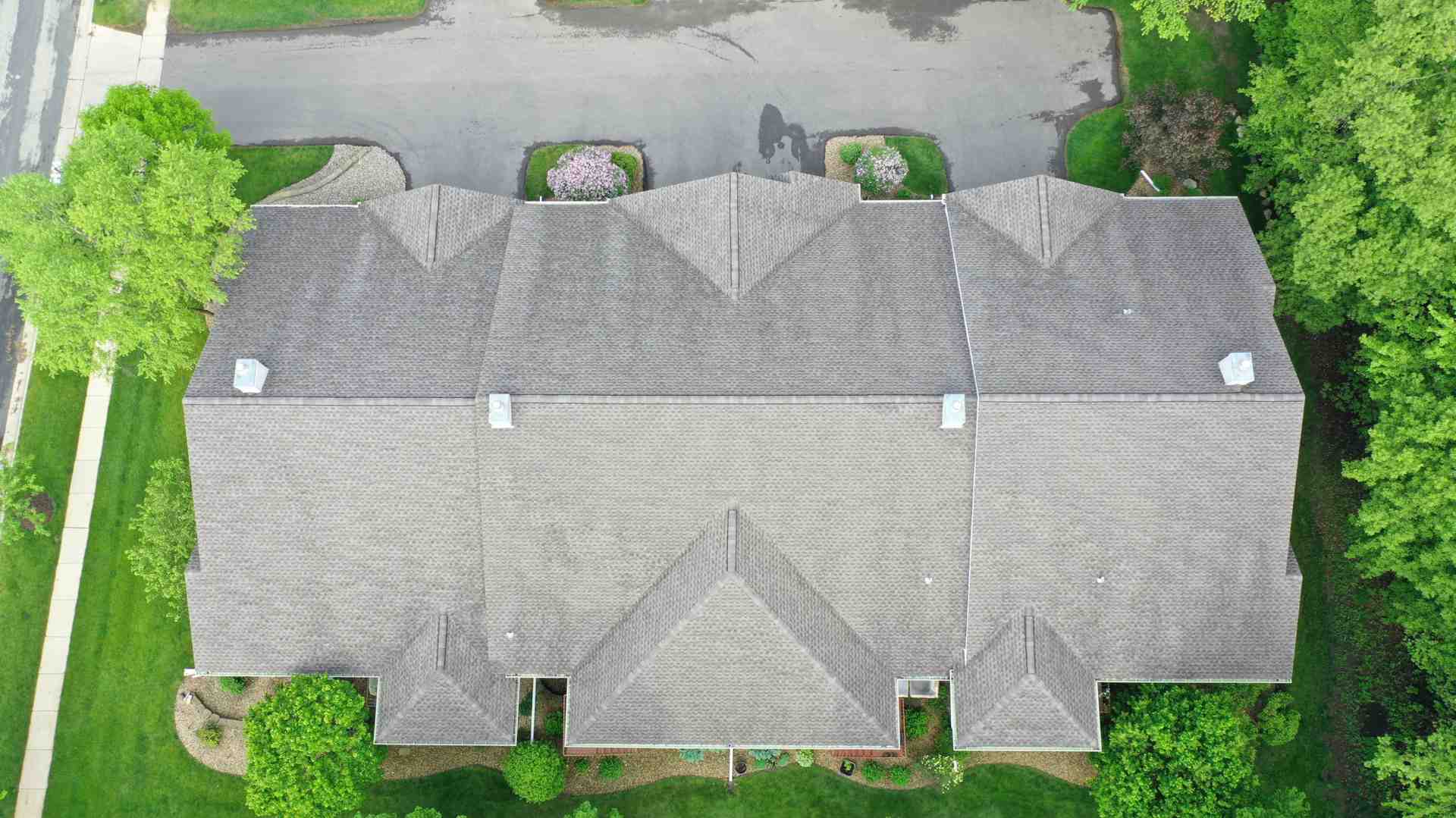 professional drone inspecting a roof - roofing in Des Moines IA