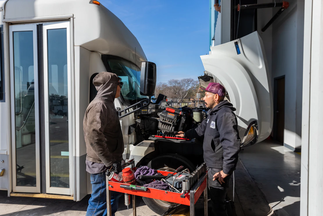 Diesel mechanic performing roadside assistance services in San Antonio, Texas