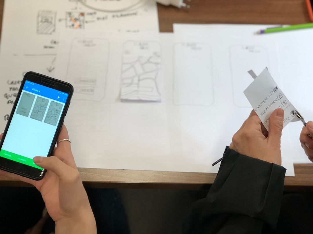Person holding smartphone representing AI scavenger hunt technology. Photo by Amélie Mourichon on Unsplash