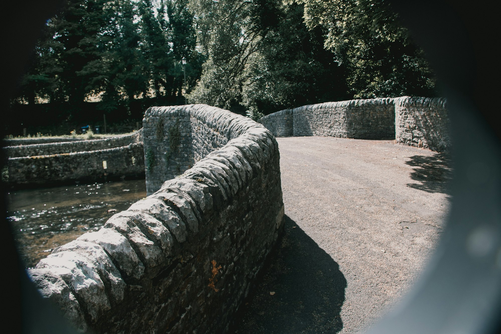 Stone bridge and path in the English countryside. Photo by Ged Mullen-Buick on Unsplash