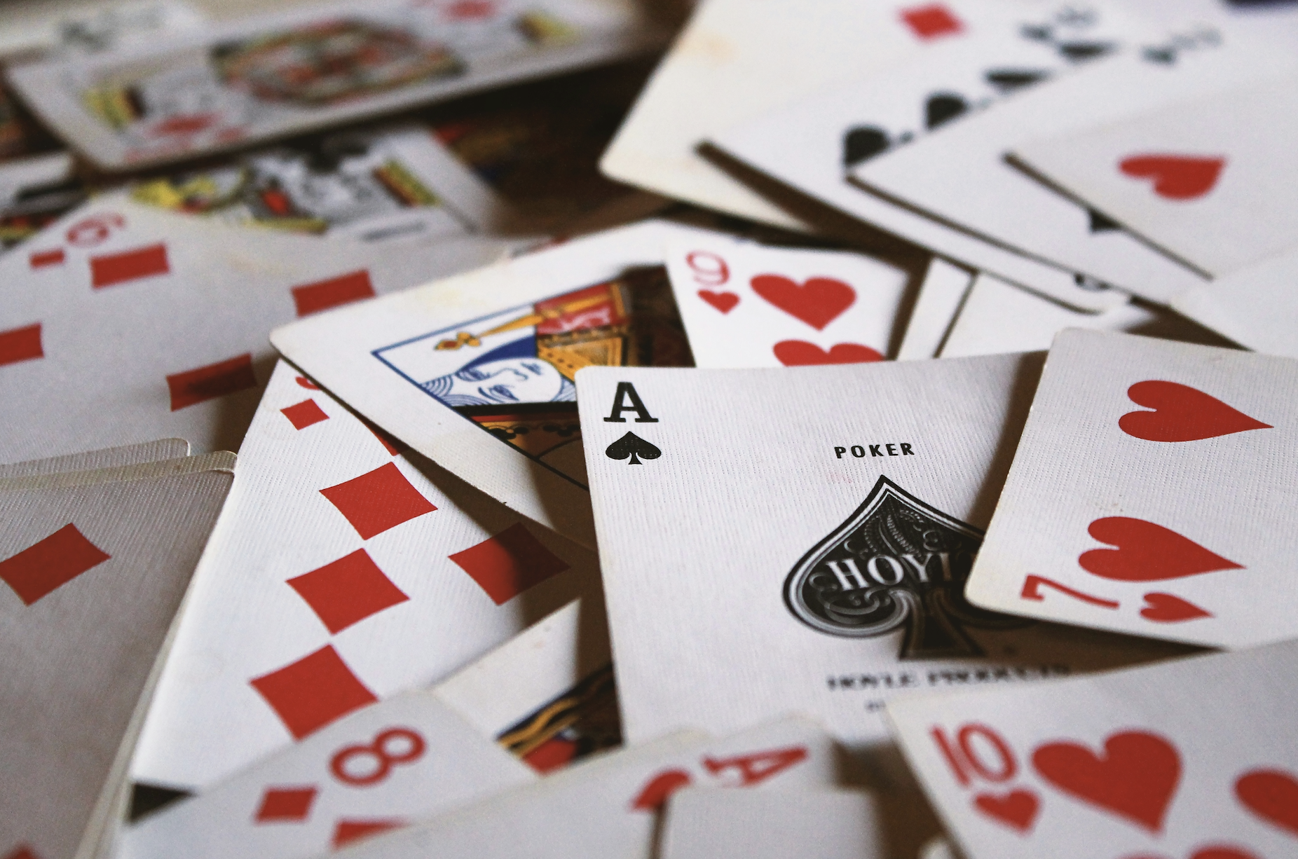 PlayTours poker run feature showing playing cards collected from scavenger hunt checkpoints