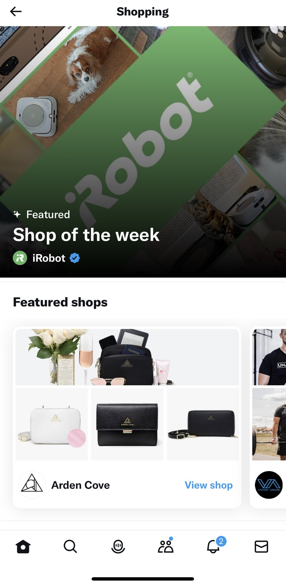 A screenshot of Twitter's Shopping Home tab on iOS showing a shop of the week in the hero and Featured shops immediately below.