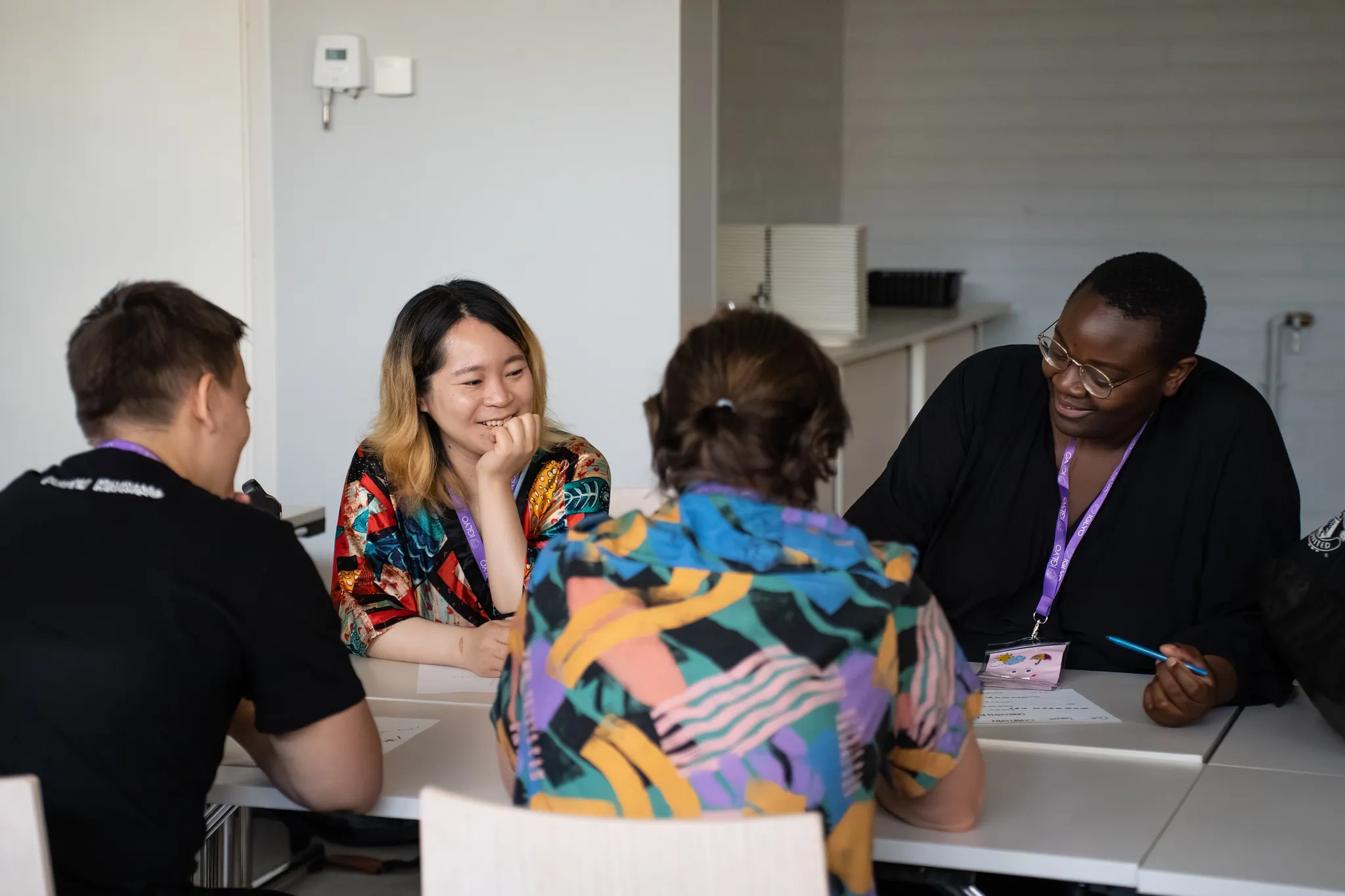Picture of two participants of the Health & Advocacy Conference Zagreb 2022 learning together at a table.