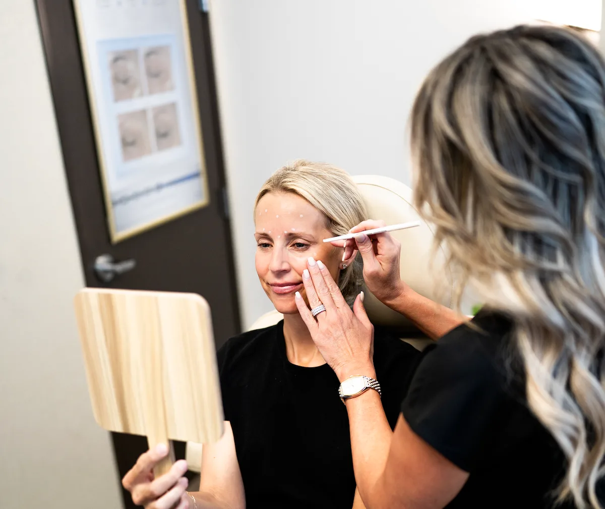 Injector marking a client's face before injectables, Injectable Club membership in Westminster, CO