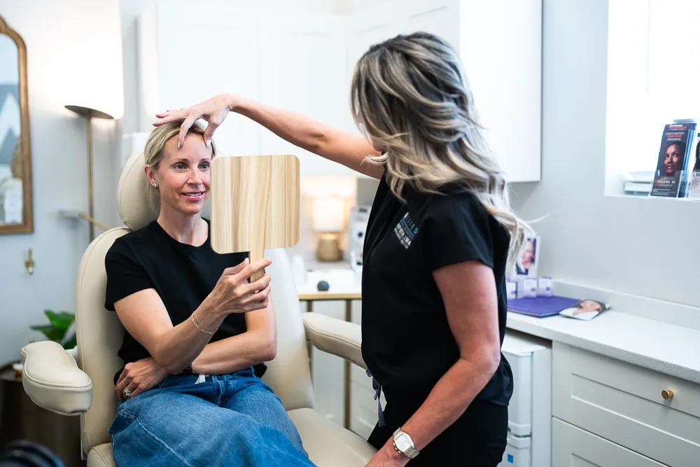 Allied Medical Aesthetics team member with a client in Westminster, CO
