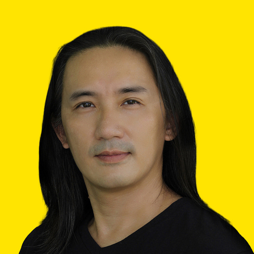 Photo of a man looking at the camera and smiling