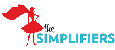Logo featuring a red silhouette of a woman with a cape standing confidently next to the words 'The SIMPLIFIERS' in black and blue text.
