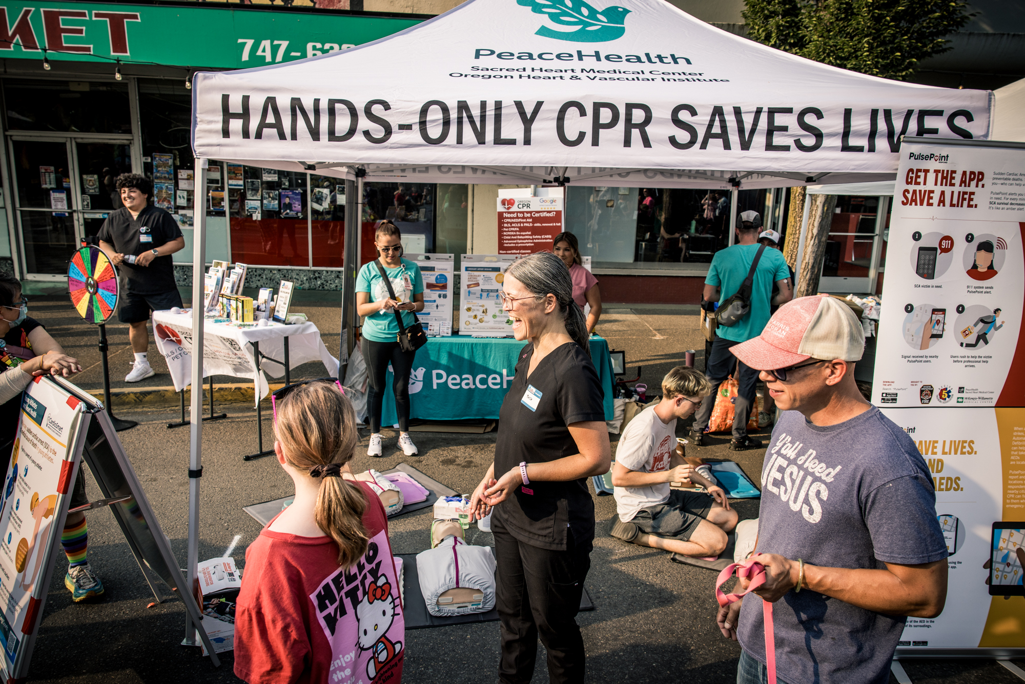 Downtown Springfield at The Block Party 2025 - Oregon CPR from PeaceHealth, Ken Kesey Mural, Main Street, Springfield Oregon