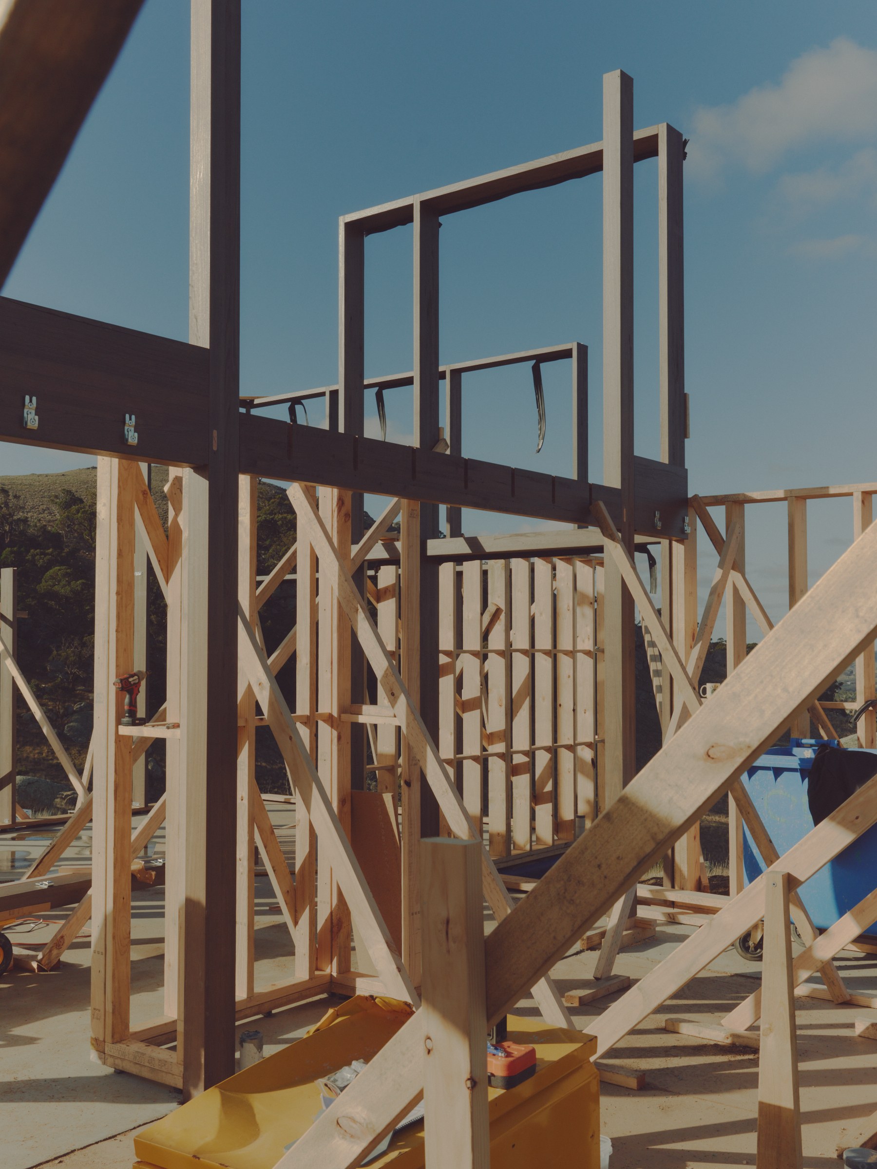 Two-storey timber framing before glazing installation.