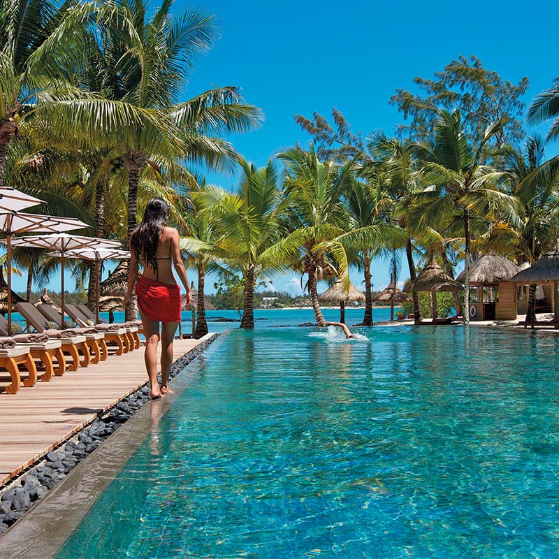 Guests swimming in the pool