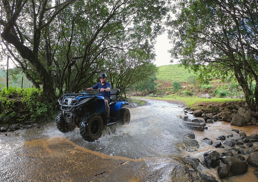 Quad biking through a river