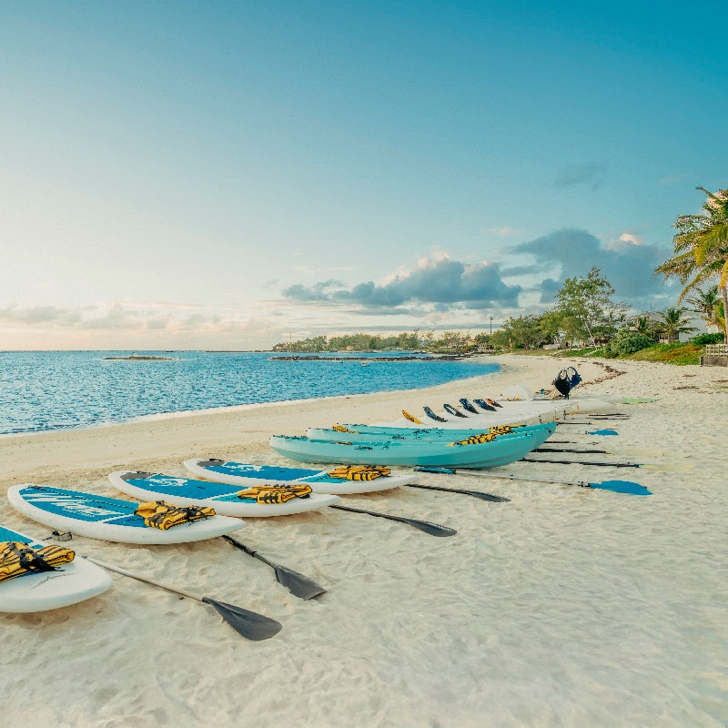 Kayaks on the beach and lagoon