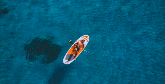 Paddle boarder on the sea