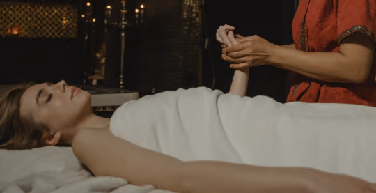Person lying down having a massage.
