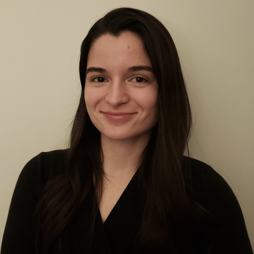 Marjorie Bates, MA: A headshot of Marjorie smiling against a plain background.
