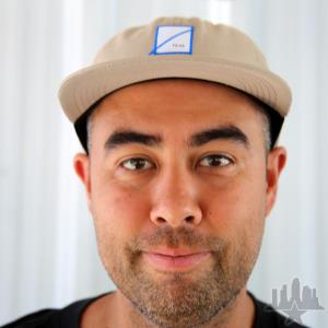 Photo portrait of a man wearing a cap.