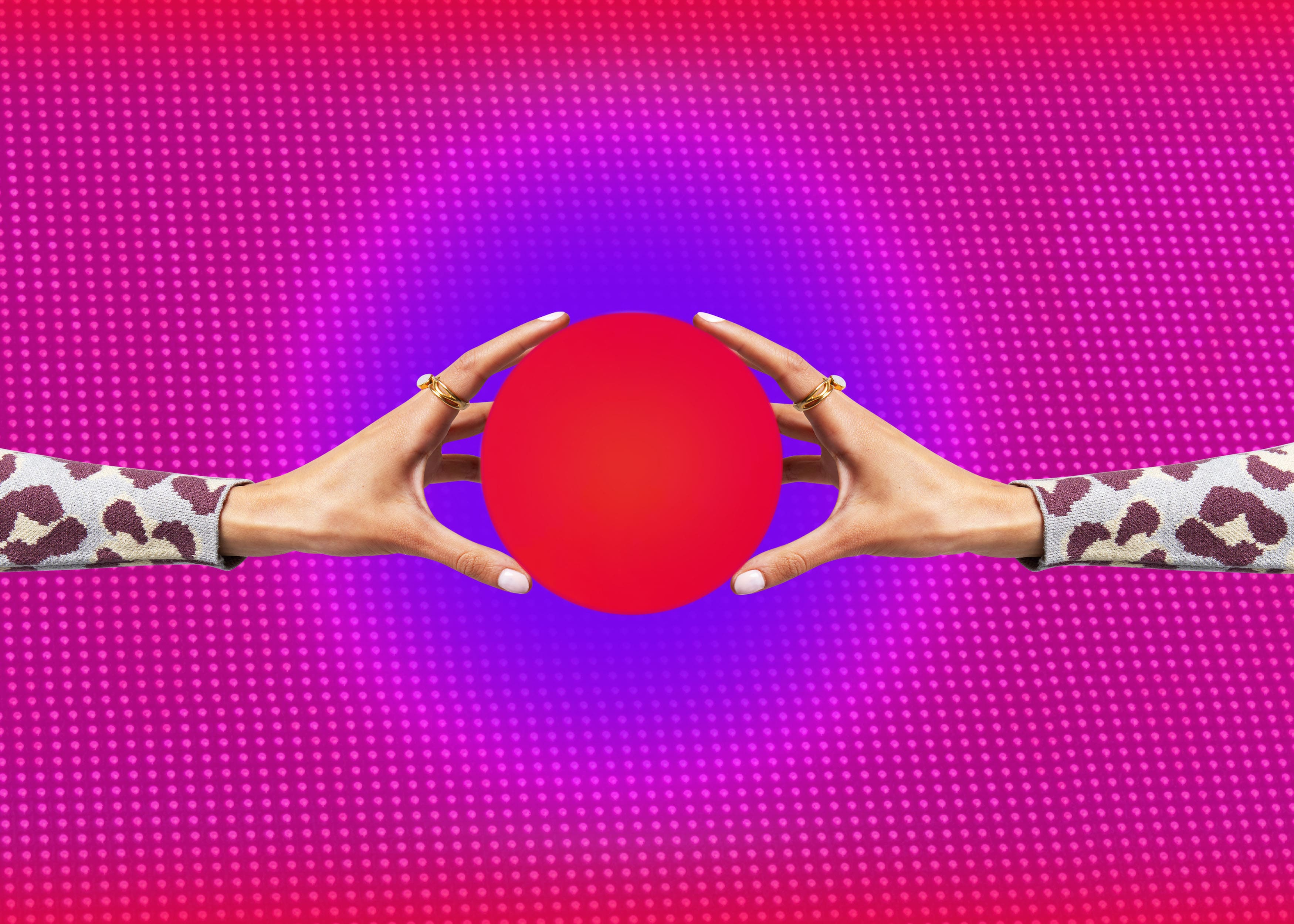 Two hands reaching in from either side to hold a red circle against a magenta gradient