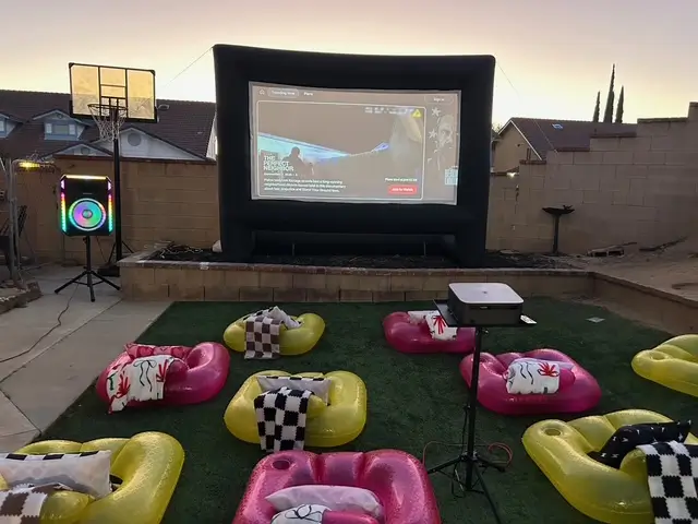 Outdoor movie setup with inflatable screen, themed decor and family-friendly cinema experience in Inland Empire