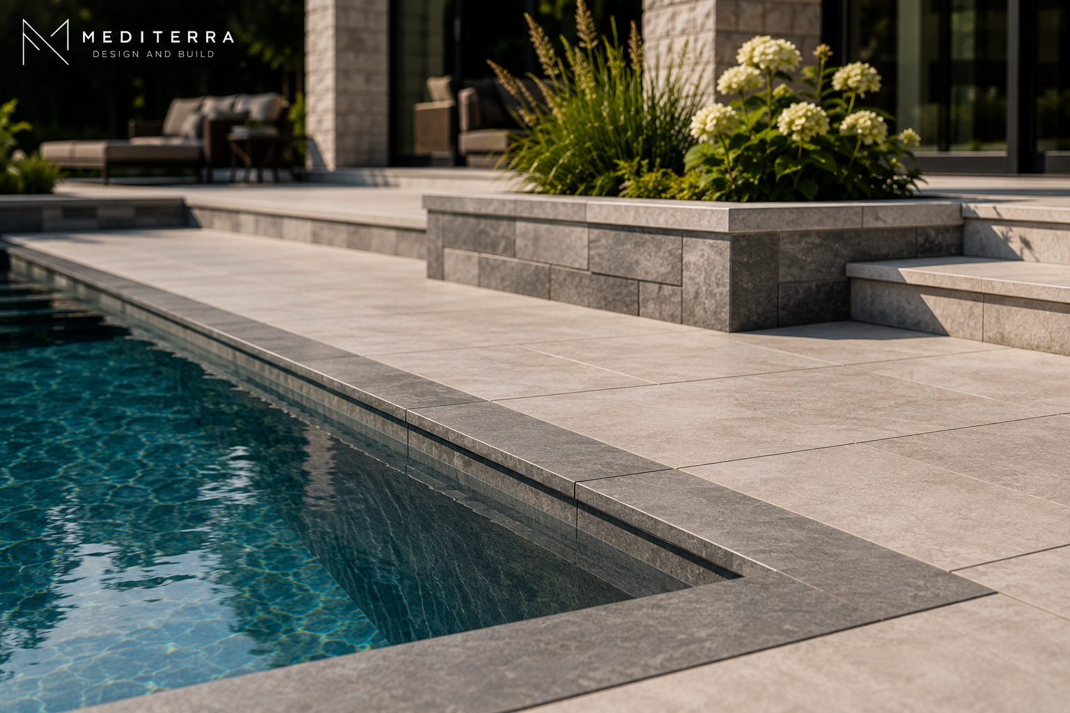 Architectural pool terrace with porcelain paving and integrated coping in Toronto 