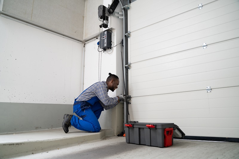 Garage door technician at work