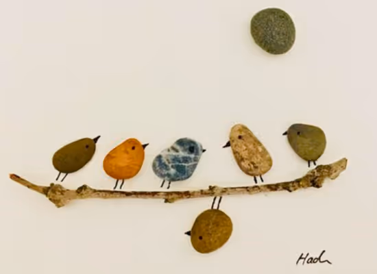 A nice piece of art included painted pebbles