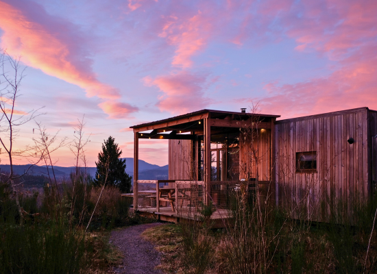A Nutchel cosy cabin in the evening in autumn, the perfect place for last-minute holidays
