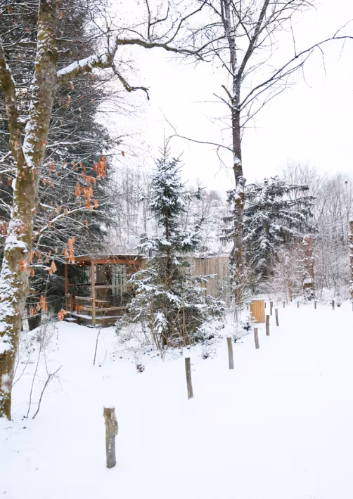 A snowy landscape at Nutchel Alsace, the perfect setting to enjoy winter activities Alsace has to offer.