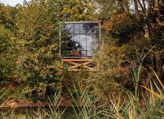The Sweet cabin, a romantic tiny house near Paris, surrounded by trees in spring