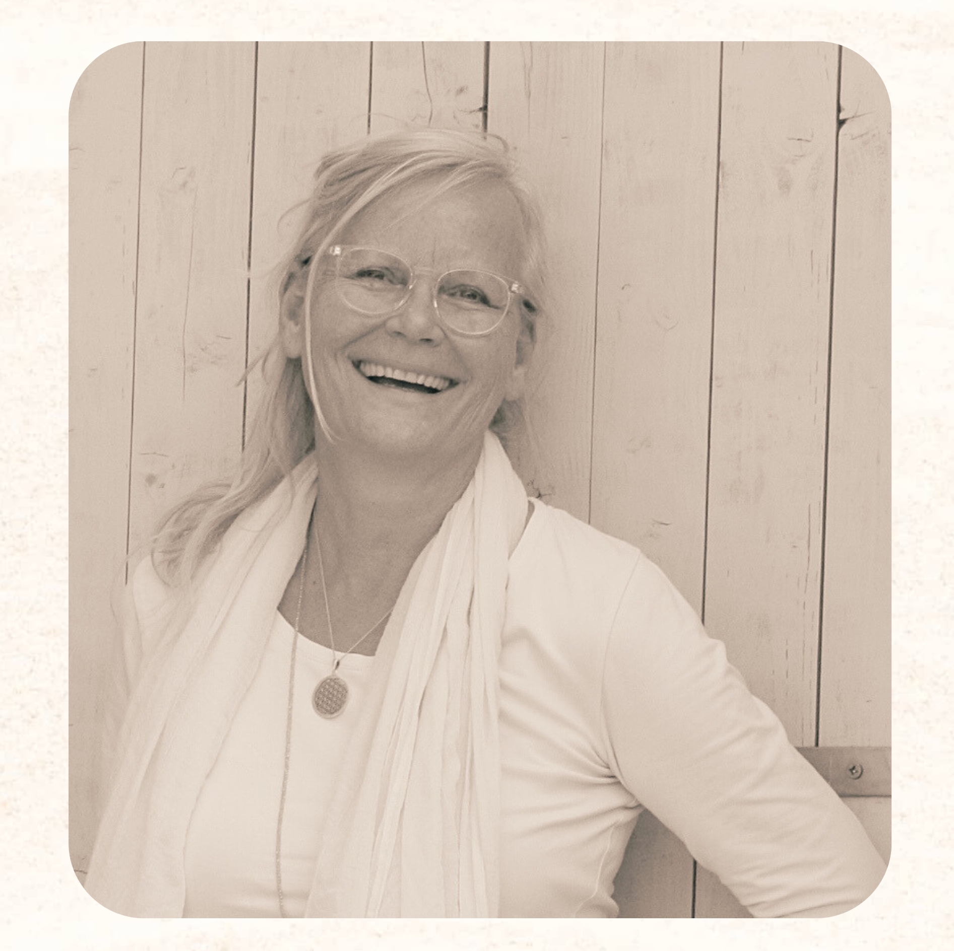 Portrait of a happy woman in light clothing