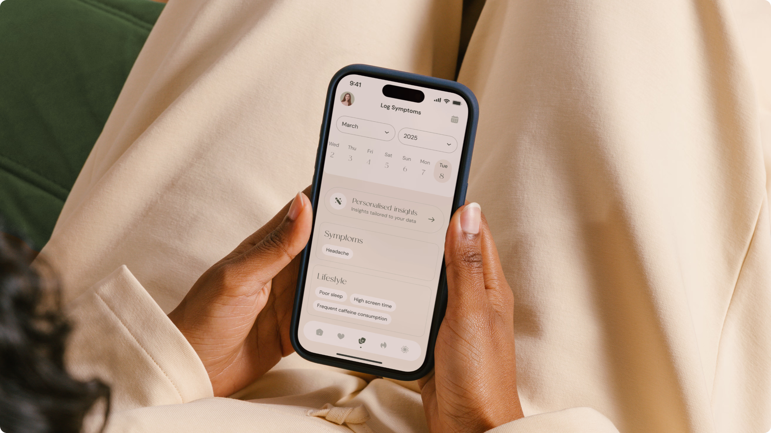 Woman using the Ahlya mobile app to log symptoms and receive personalized insights