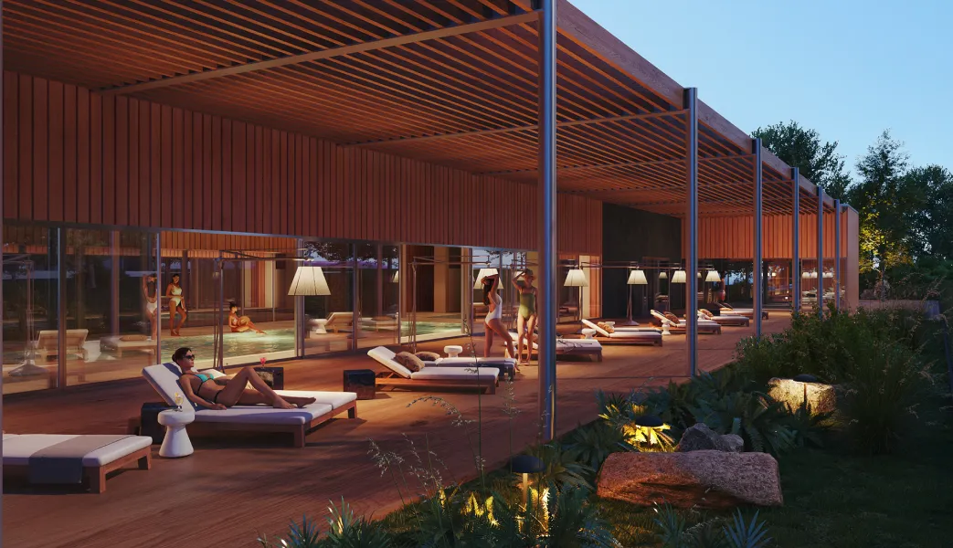 A group of people lounging on a deck next to a swimming pool.