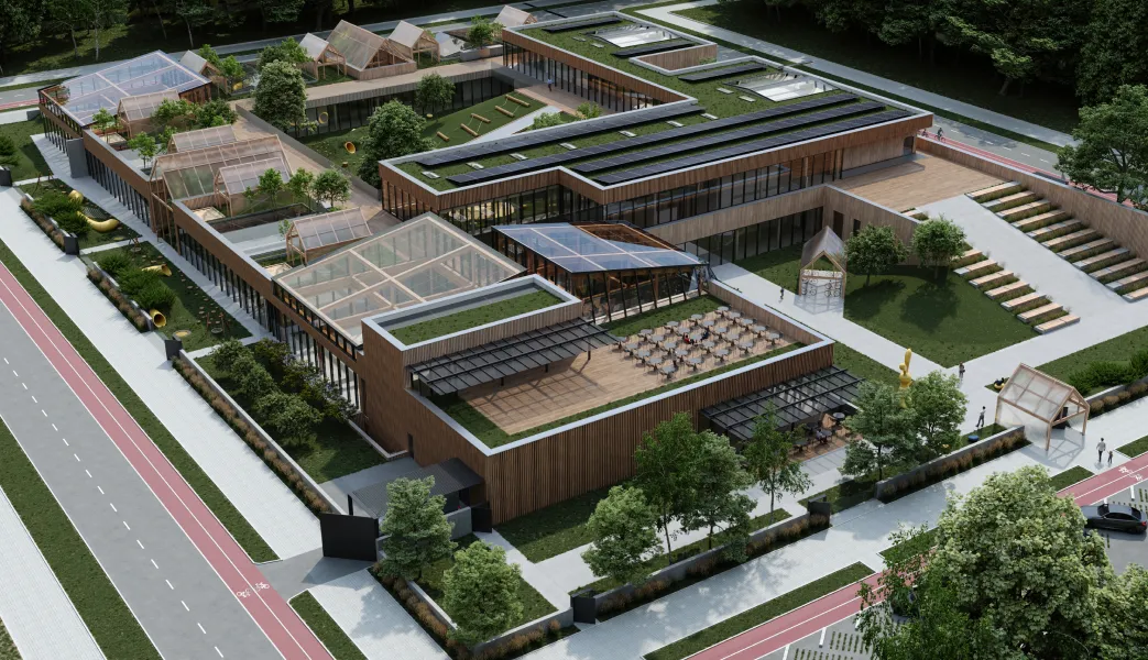 An aerial view of a building with a green roof.