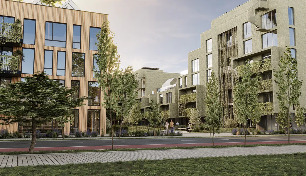 A row of apartment buildings next to a street.