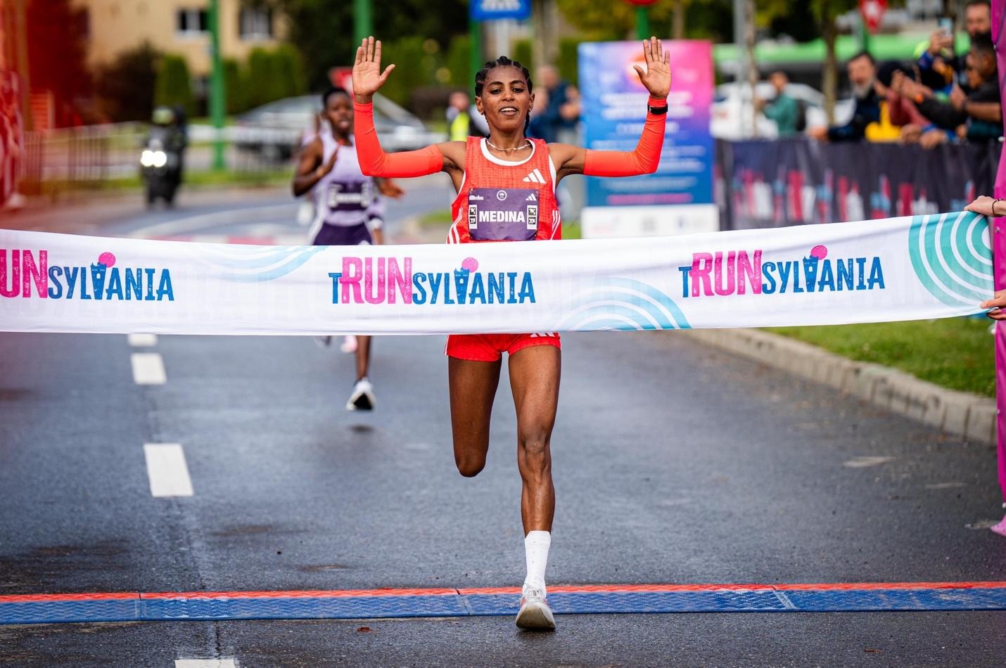 A person running in a raceAI-generated content may be incorrect.