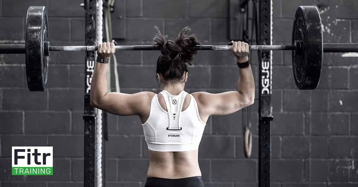 Barbell Shoulder Press In A Gym