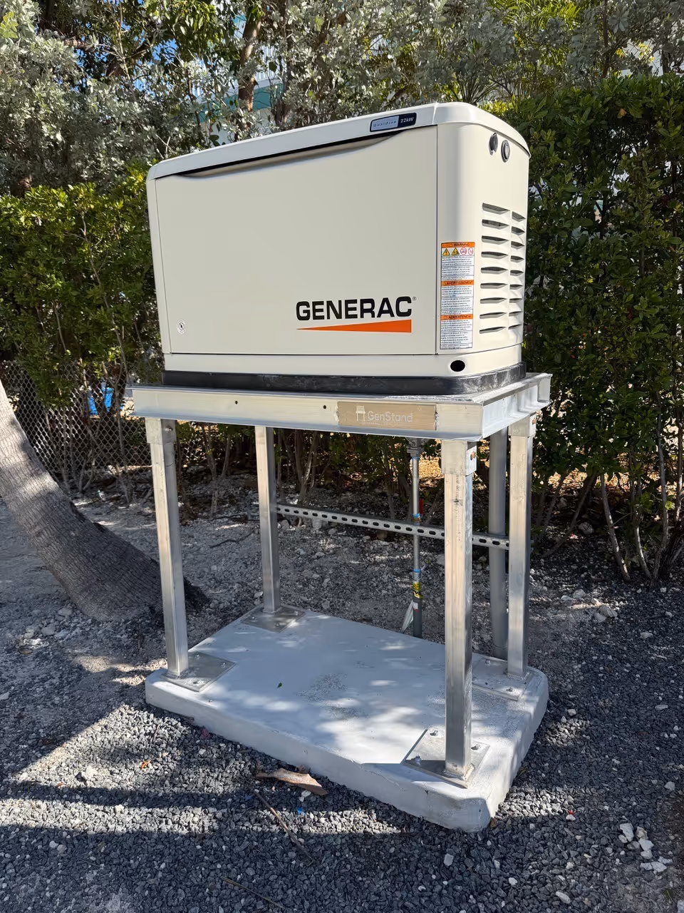 Generac generator mounted on elevated stand for flood protection in Key West