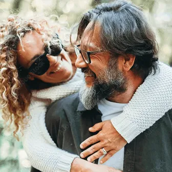 man and a woman holding each other 