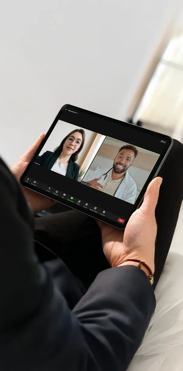 image of a person holding an ipad with images of adhd therapists