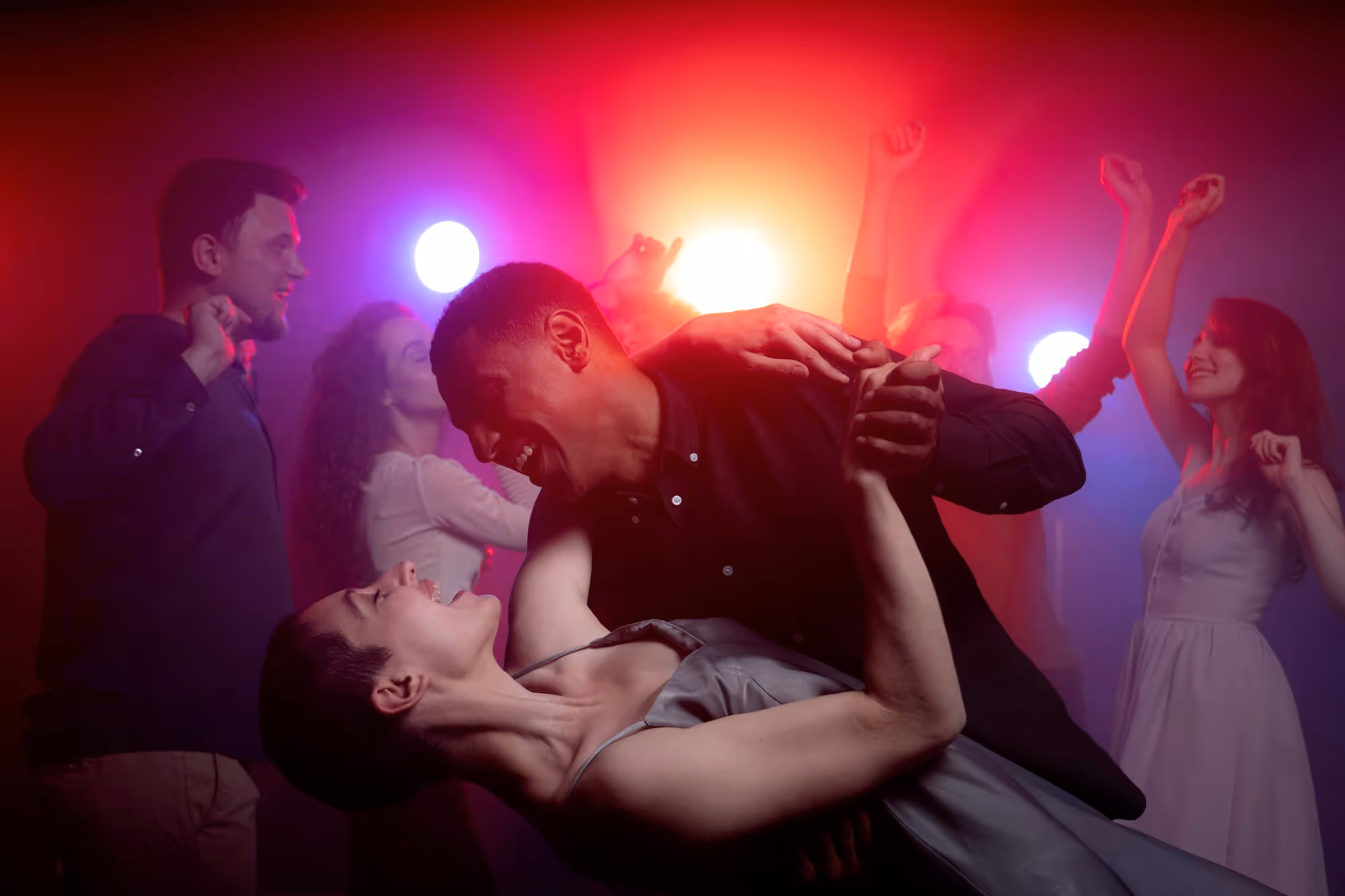 nightlife with people dancing in a club