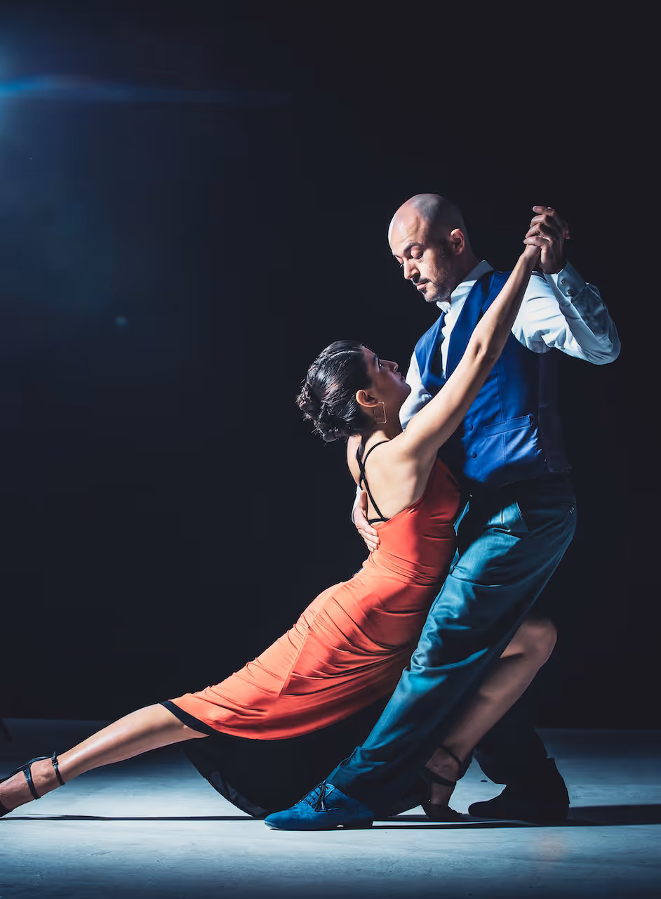 Woman And Man Dancing Under Light