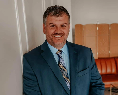 A portrait of Coach Kevin Miles