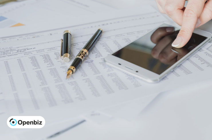 Legal documents with pens and a smartphone, apostille paperwork